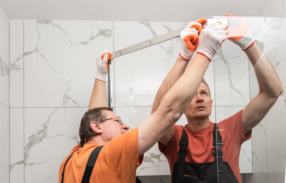 maintenance team working in a hotel bathroom