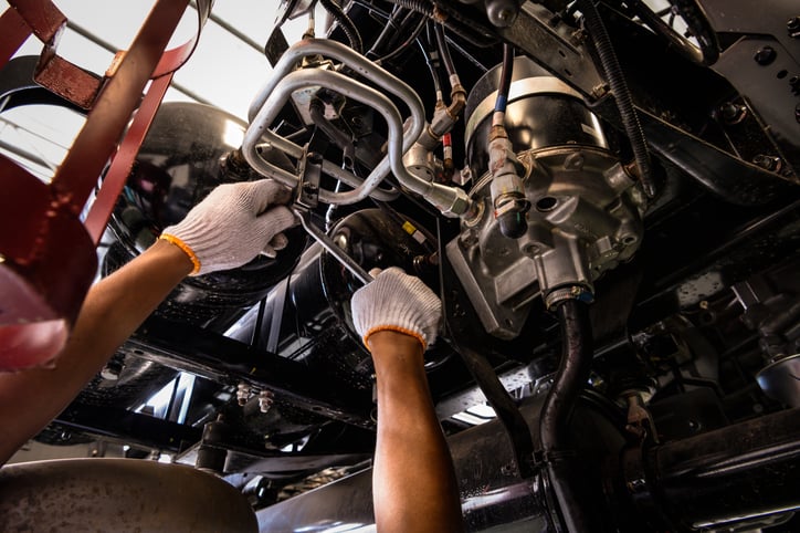 maintenance personnel reading manual outlining concepts like planned maintenance, corrective maintenance, proactive maintenance, preventive maintenance vs, types of preventive maintenance, preventive maintenance schedules