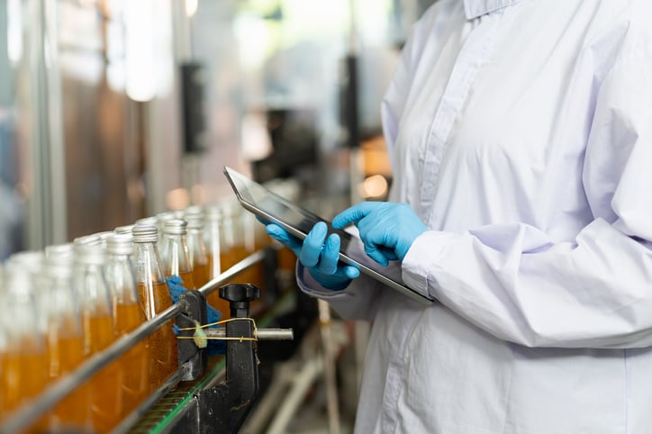 business owner reading a literature database containing federal regulations on medical devices as well as food related policies and how it governs food under laws