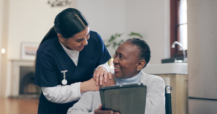 family members learning how technology like remote monitoring in wearable devices can help with fall detection and can improve patient outcomes