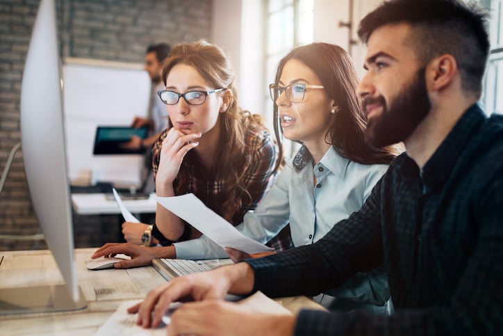 woman researching a computerized maintenance management solution when selecting a cmms software 