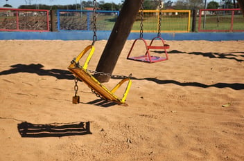 broken swing in school maintenance required