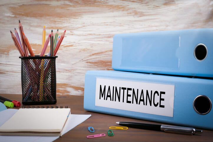 facility managers performing preventive maintenance tasks with work order management software